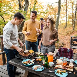 Preparing food outdoors together